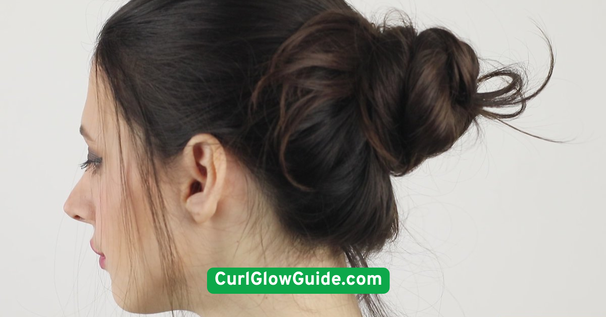 Messy Curly Bun with Face-Framing Strands